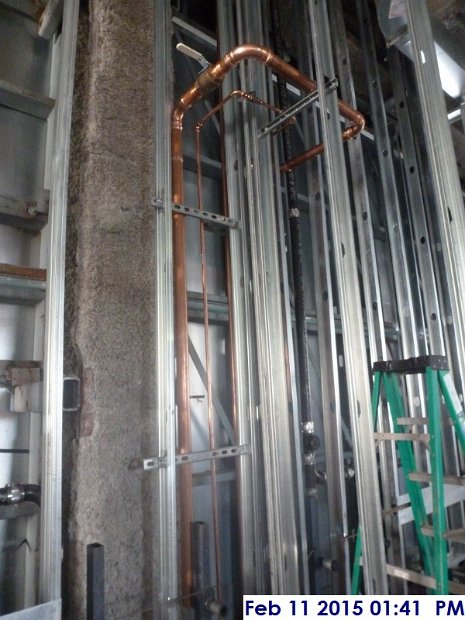 Installing copper piping at the 2nd floor Facing North